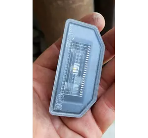 Подсветка номера, 1449730-00-B, Tesla Model Y 20-24г., Підсвітка номерного знаку, 1449730-00-B, Тесла Модел У 20-24р. Подсветка номера, 1449730-00-B, Tesla Model Y 20-24г., Підсвітка номерного знаку, 1449730-00-B, Тесла Модел У 20-24р.